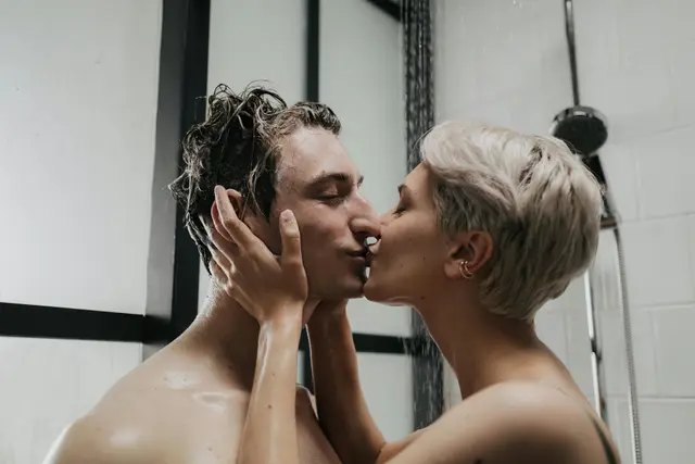 Couple in the shower in close-up